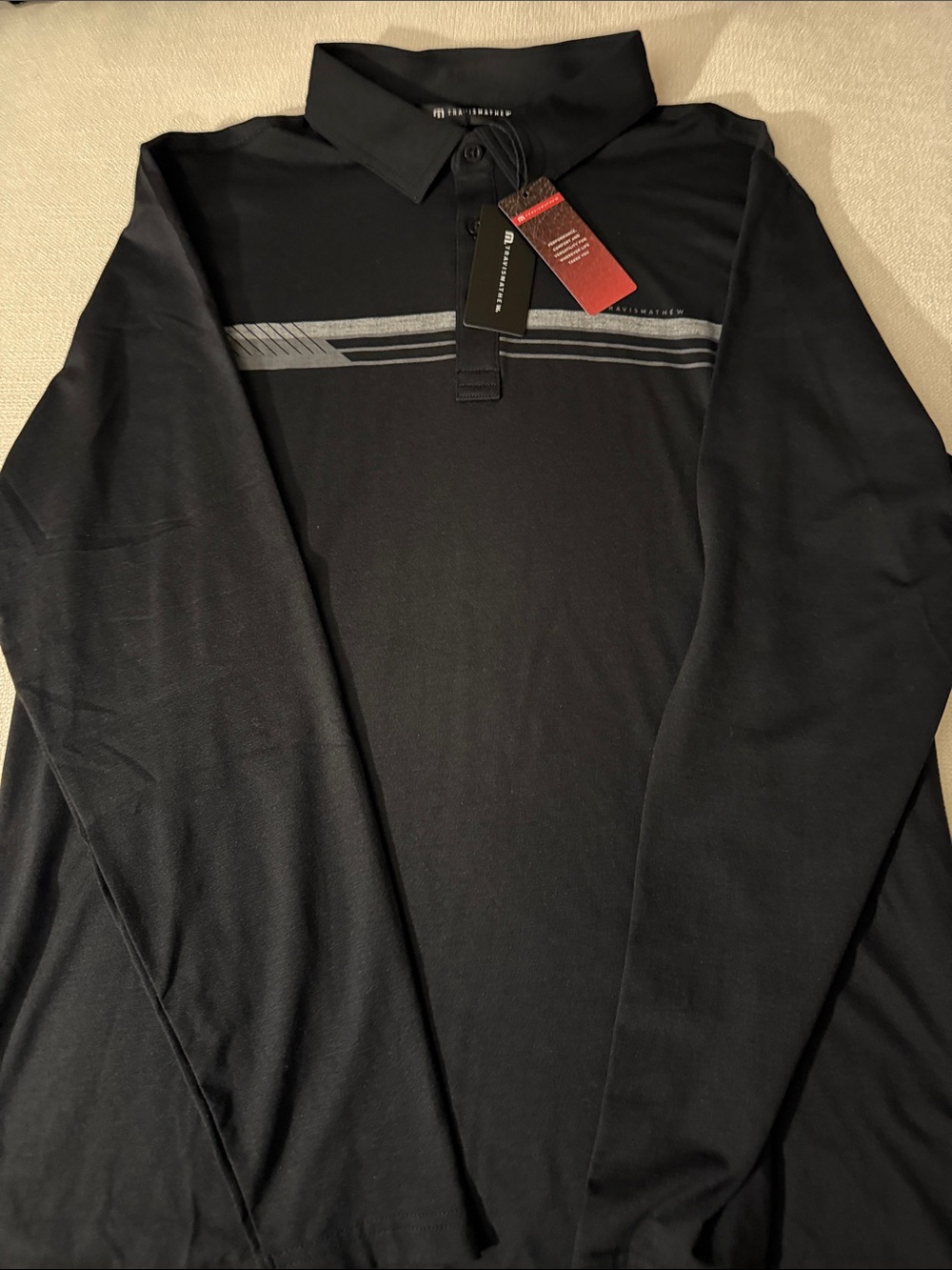 NWT Travis Mathew Black Polo with Gray Chest Stripes